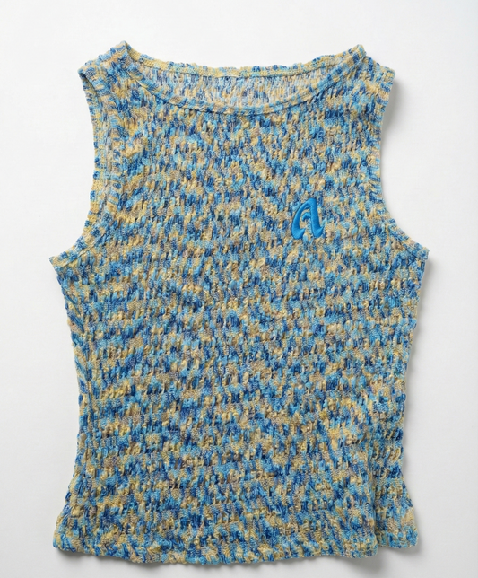 Blue and yellow patterned sleeveless top on a white background