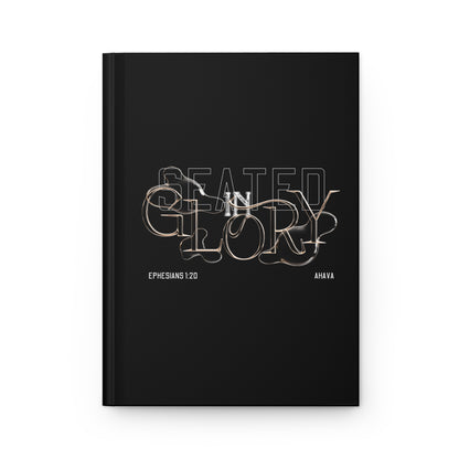 Black notebook with white text on a black background